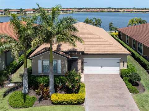 303 TOSCAVILLA BOULEVARD, NOKOMIS, FL 34275