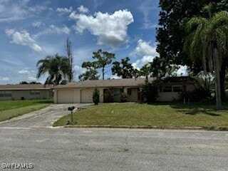 818 Gardenside Court, Lehigh Acres, FL 33936