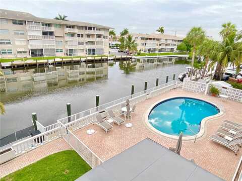 419 Golden Isles Dr, Hallandale Beach, FL 33009