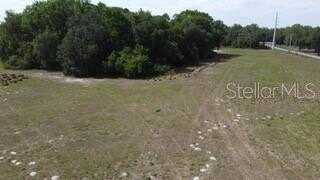 Across 1875 CR 416N, LAKE PANASOFFKEE, FL 33538