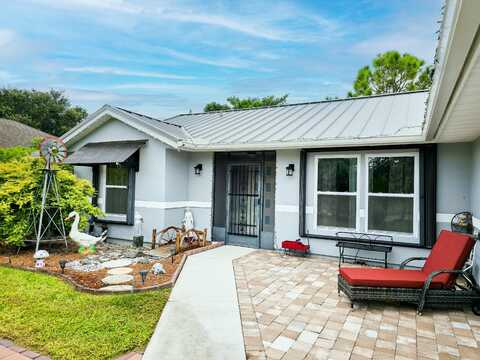 718 SW Abraham Avenue, Port Saint Lucie, FL 34953