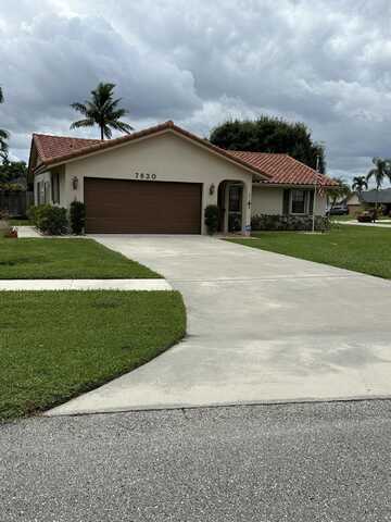 7630 Woodland Creek Lane, Lake Worth, FL 33467