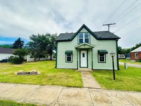 210 E 1st St, Lucas, KS 67648