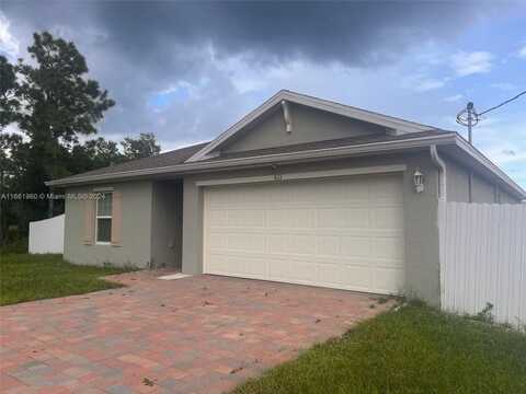 611 Woodcrest Dr, Lehigh Acres, FL 33972