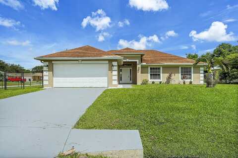 1897 SW Lofgren Avenue, Port Saint Lucie, FL 34953