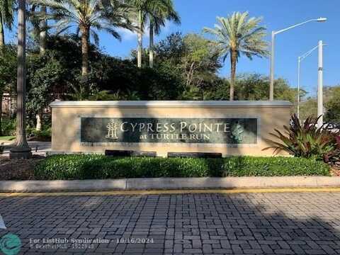 6976 W Sample Rd, Coral Springs, FL 33067