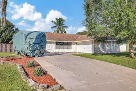 1092 SE Prineville Street, Port Saint Lucie, FL 34983