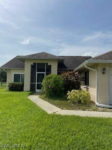 409 McKinley Avenue, Lehigh Acres, FL 33972