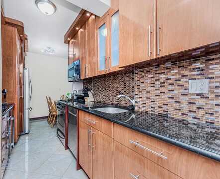 99-60 63rd Road, Rego Park, NY 11374