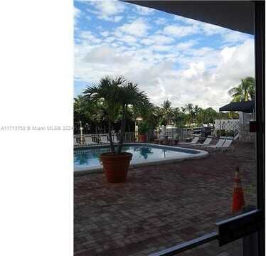 401 Golden Isles Dr, Hallandale Beach, FL 33009