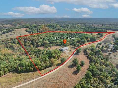 228 River Canyon Road, Macks Creek, MO 65786