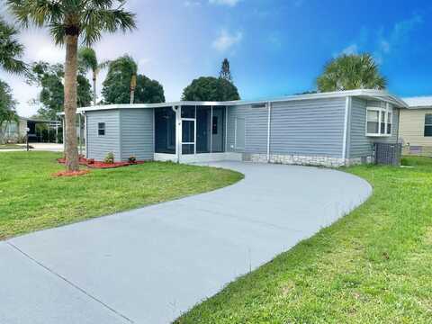 1038 Warbler Court, Barefoot Bay, FL 32976