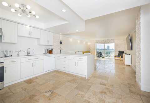 437 Golden Isles Dr, Hallandale Beach, FL 33009