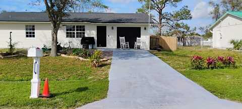 1562 SW Curry Street, Port Saint Lucie, FL 34983