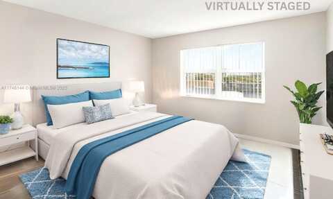 401 Golden Isles Dr, Hallandale Beach, FL 33009