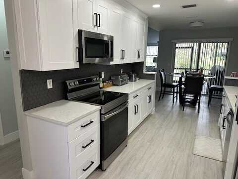 1527 Woodbridge Lakes Circle, West Palm Beach, FL 33406