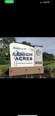 523 WOODMAN DRIVE, LEHIGH ACRES, FL 33972