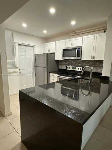 1101 Crystal Lake Dr, Deerfield Beach, FL 33064