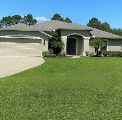104 S COOPERS HAWK WAY, PALM COAST, FL 32164