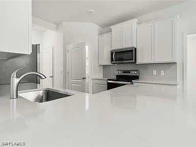 209 SE 26TH Terrace, Cape Coral, FL 33904