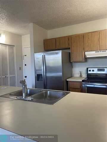 2401 Riverside Dr, Coral Springs, FL 33065