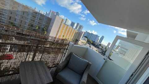 401 Golden Isles Dr, Hallandale Beach, FL 33009