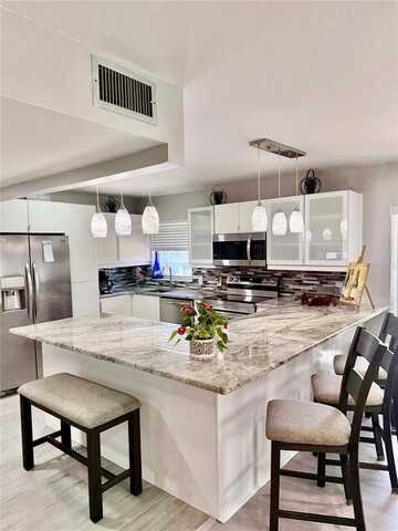 7003 SUNSET WAY, ST PETE BEACH, FL 33706