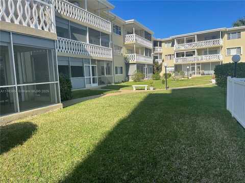 450 Golden Isles Dr, Hallandale Beach, FL 33009