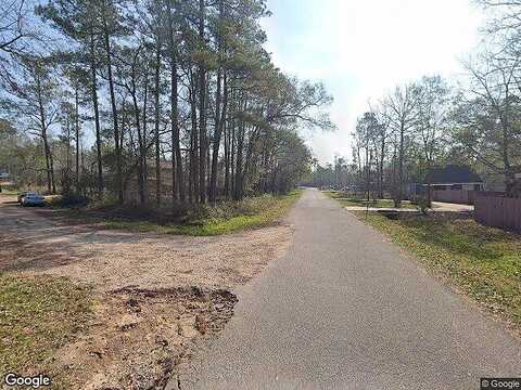 Apache St, Willis, TX 77378