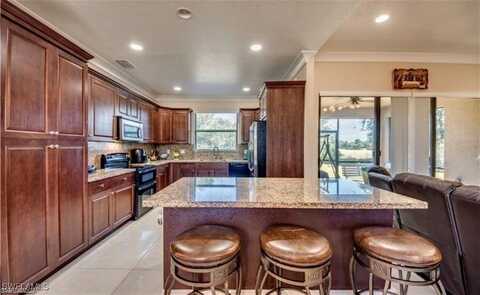906 Sunniland Boulevard, Lehigh Acres, FL 33971
