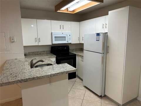 951 Lyons Rd, Coconut Creek, FL 33063