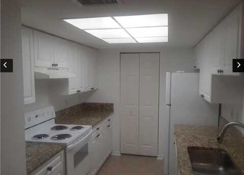 100 Crestwood Court N, Royal Palm Beach, FL 33411