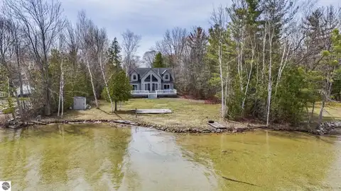 7734 N Shore Court, Grawn, MI 49637