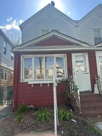 97-22 84th Street, Ozone Park, NY 11416