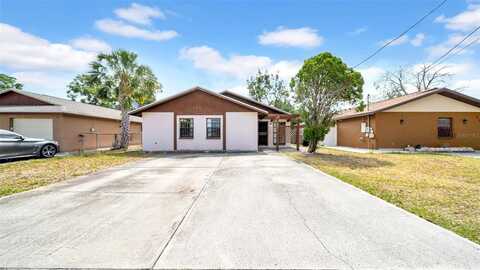 6915 N HUBERT AVENUE, TAMPA, FL 33614