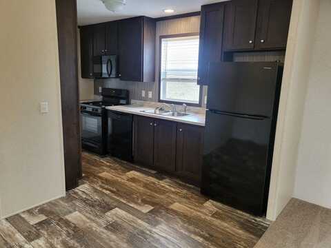 256 Spruce, Highland, MI 48357