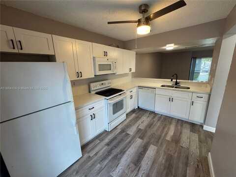 843 Crystal Lake Dr, Deerfield Beach, FL 33064