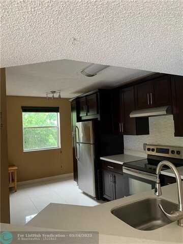 8891 Wiles Rd, Coral Springs, FL 33067