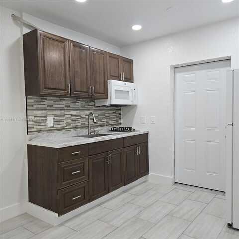 1230 NW 70 st, Miami, FL 33147
