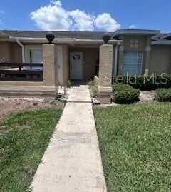 3306 SANDY SHORE LANE, KISSIMMEE, FL 34743
