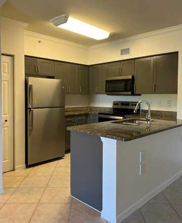 6434 Emerald Dunes 302 Drive, West Palm Beach, FL 33411