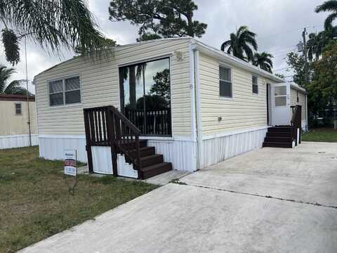 8 Ricks Drive, Greenacres, FL 33463