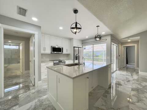 6503 Geminata Oak Court, Palm Beach Gardens, FL 33410