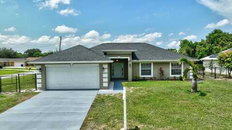 1897 SW Lofgren Avenue, Port Saint Lucie, FL 34953