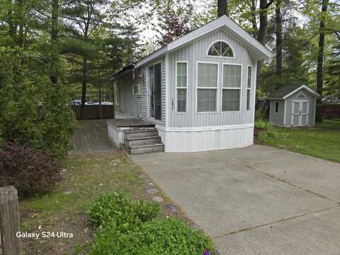 2757 Owens, Unit #163 Drive, Houghton Lake, MI 48629