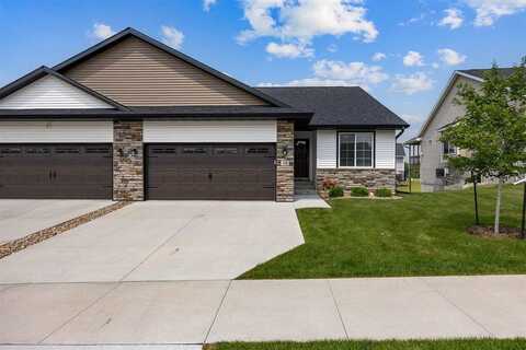 711 Creekside Dr, Tiffin, IA 52340