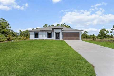 1032 MAXWELL AVE S, Lehigh Acres, FL 33974