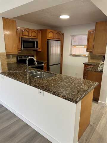 2820 Riverside Dr, Coral Springs, FL 33065