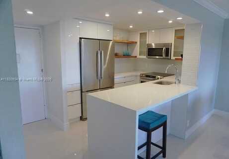401 Golden Isles Dr, Hallandale Beach, FL 33009