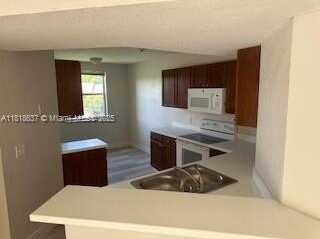 8741 Wiles Rd, Coral Springs, FL 33067
